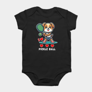 I Love Pickle Ball, Cute Dog playing Pickle Ball, funny graphic t-shirt for lovers of Pickle Ball and Dogs Baby Bodysuit